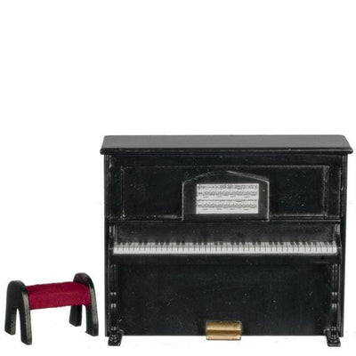 A black dollhouse miniature upright piano with bench.