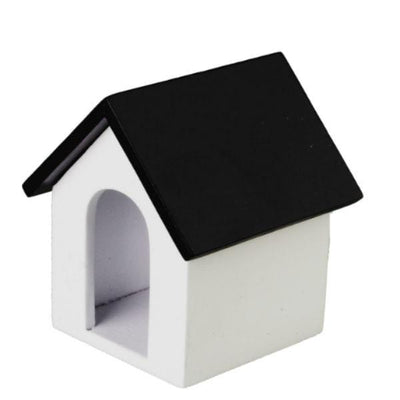A dollhouse miniature dog house.
